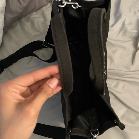 Marc Jacob’s. All black tote and white lettering. It is 13 inches. - Picture 7 of 7